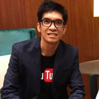Jonathan de Belen in a navy blazer